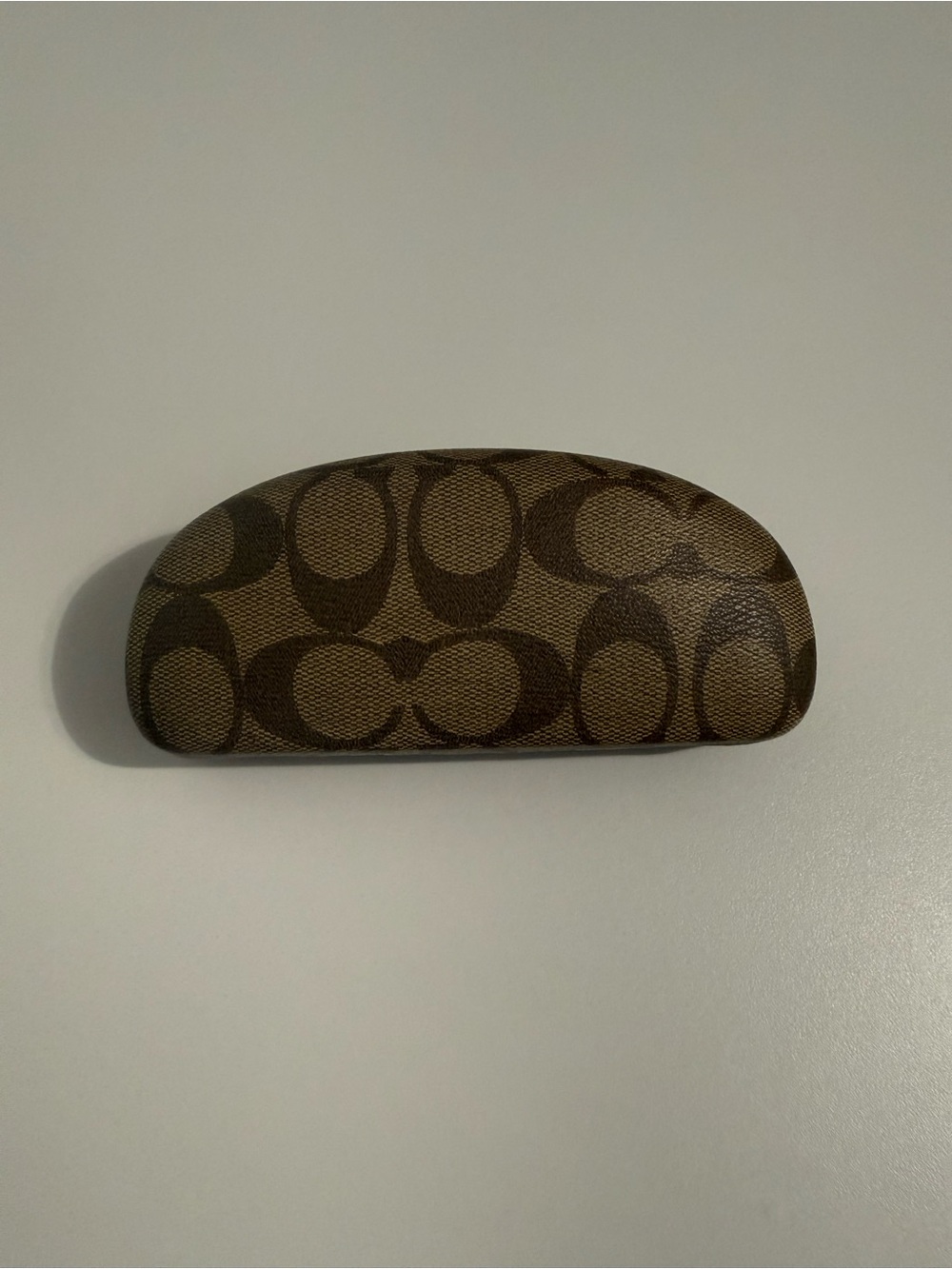 Coach brown and beige monogram glasses case